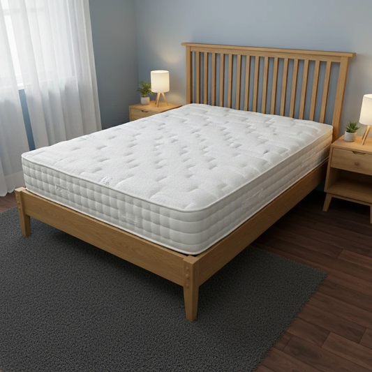 Bed room view photo of the Plaza king mattress styled on a luxury bed frame with minimalist bedroom decor.