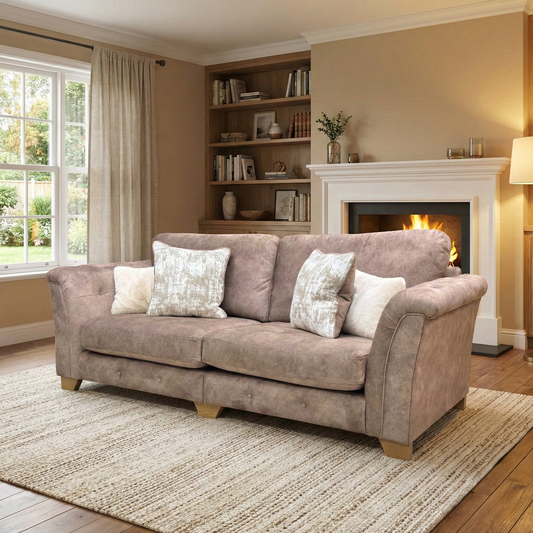 Living room of the Aura sofa, highlighting the luxurious chocolate velvet upholstery and deep buttoned border detailing