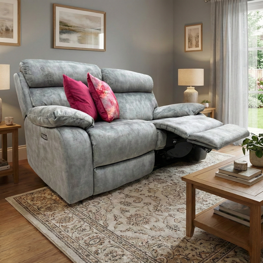 Lifestyle photo of the Moreno Neutral Grey velvet sofa, highlighting its plush cushions and modern silhouette in a bright living room setting.