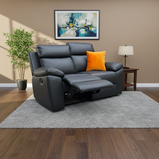 Living room shot of the ‘Edison’ black faux leather sofa, highlighting the durable upholstery and padded armrests.