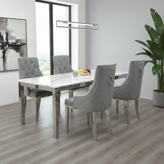 Living Room view of the grey velvet dining chair highlighting the luxury quilted button-back design.