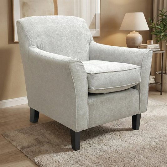 Living Room view of the Kiera grey chair highlighting the deep seat and elegant, clean lines.
