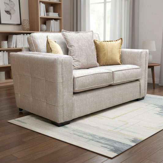 Living Room view of the beige vogue velvet 2-seater sofa highlighting its elegant silhouette and plush armrests.