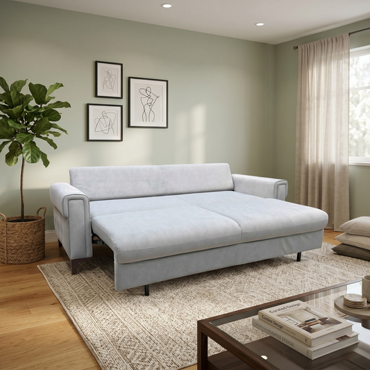 Living room view for the Zoom 3-seater sofa bed, highlighting the luxurious NV-0107 grey velvet fabric, spacious seating area, and easy fold-down click-clack conversion mechanism.