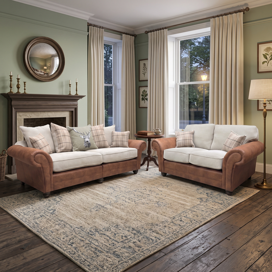 Styled upscale living room lifestyle layout featuring the complete Charles Sultan Oatmeal 4-seater and 2-seater sofa set arranged as a sophisticated, warm, and inviting family lounge center.