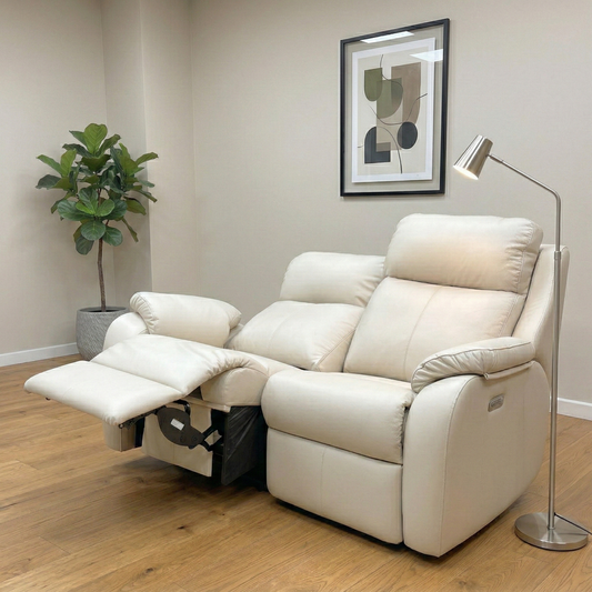 Living room view of G Plan ‘Kingsbury’ 2-seater power recliner sofa in Cambridge Stone leather, featuring a classic high-back design, elegant wing details, and premium pad-over-chaise seating.