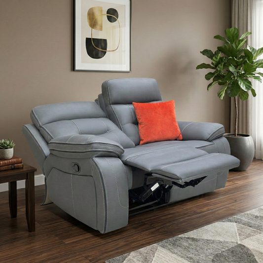 Living room view of the Dante 2-seater, showcasing the deep-filled cushions and the sophisticated neutral grey tone of the soft-touch fabric.