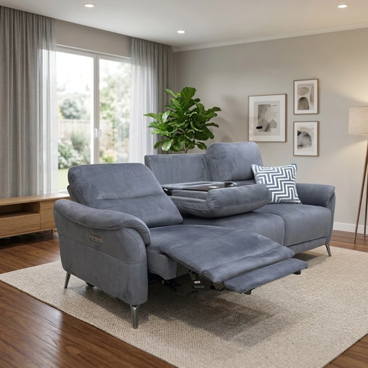 Living room for the Daytona 3-seater, highlighting the luxury Granite velvet, dual power reclining end seats, and built-in Bluetooth speaker system.