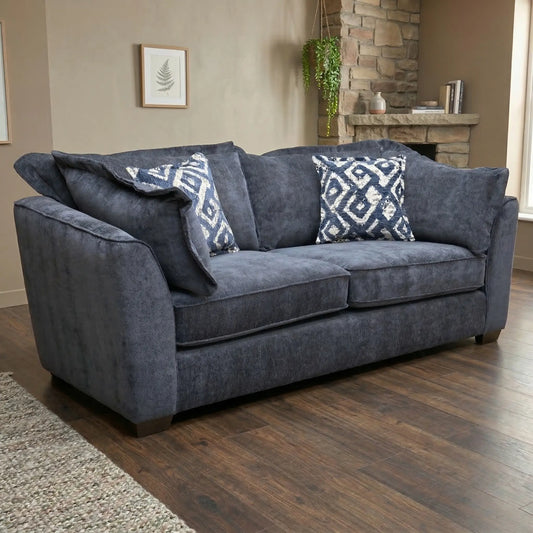 Living room view for the Finchley 3-seater sofa, highlighting the durable Denim Blue soft weave fabric, high-resilience foam seating, and sturdy hardwood frame.