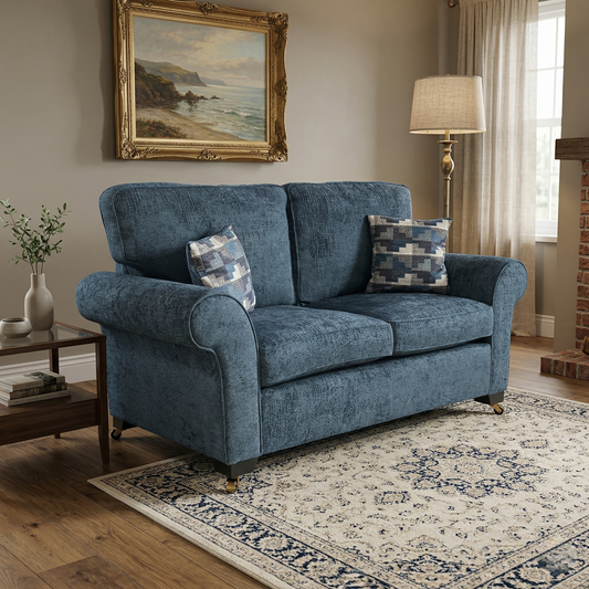 Living room view for the Hedingham 2-seater sofa bed, highlighting the premium Neptune Blue chenille upholstery, easy-to-use pull-out mechanism, and deluxe mattress.
