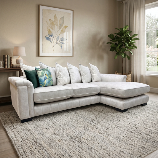 Living room of the Dolcie chaise sofa in a bright lounge setting, showcasing the generous lounging space provided by the extended chaise.