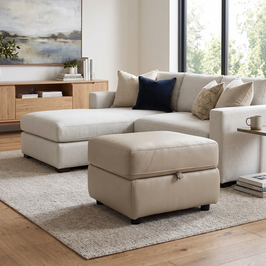 Living room of the footstool paired with a sofa, demonstrating its use as both a comfortable footrest and a storage solution.
