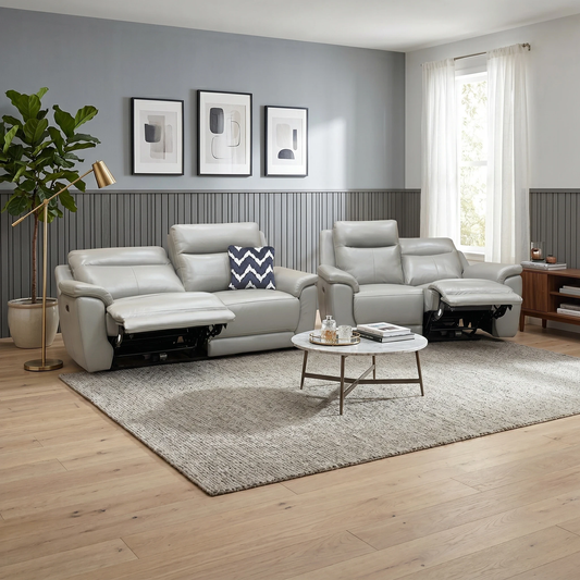 Living room for the Bobby Cat sofa set, highlighting the elephant grey leather upholstery, power reclining features, and adjustable headrests.