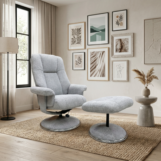 Living room view of the Bruges Light Grey Swivel Chair, highlighting the deep, curved backrest and the soft, textured fabric upholstery.