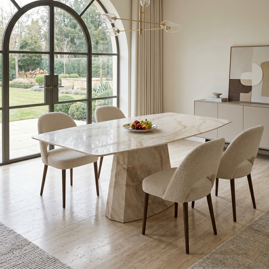 Dining room view for the Elegante dining table, highlighting the premium solid marble construction, neutral cream and beige tones, and the durable polished surface.
