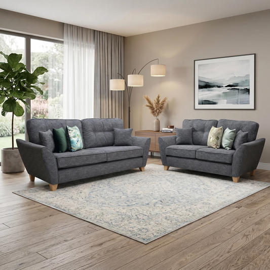 Living room view for the Halstow 3+2 sofa set, highlighting the soft-touch charcoal fabric, high-density comfort foam cores, and durable internal frame construction.