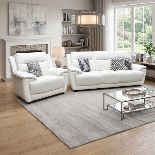 Living room view three-quarter angled view of the Touch Star White leather 3-seater couch, highlighting its deep-seated comfort, padded armrests, and sleek low-profile block feet.