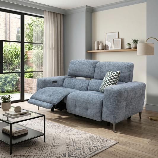 Living room view New York silverish blue fabric 2-seater sofa fully extended, demonstrating the smooth dual electric reclining footrests for premium lounge comfort.