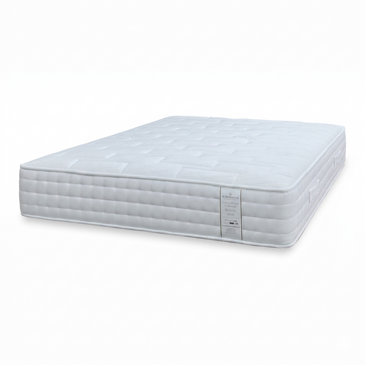 Full View ‘Penrith’ luxury pocket sprung king-size mattress, showcasing its multi-layered design with a crisp white tufted top cover and beautifully tailored side border panels.