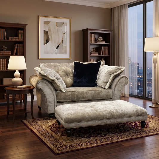 Styled upscale traditional parlor lifestyle layout featuring the Duresta Princeton Monarch Gold reading chair and footstool arranged as an inviting luxury fireside seating corner.