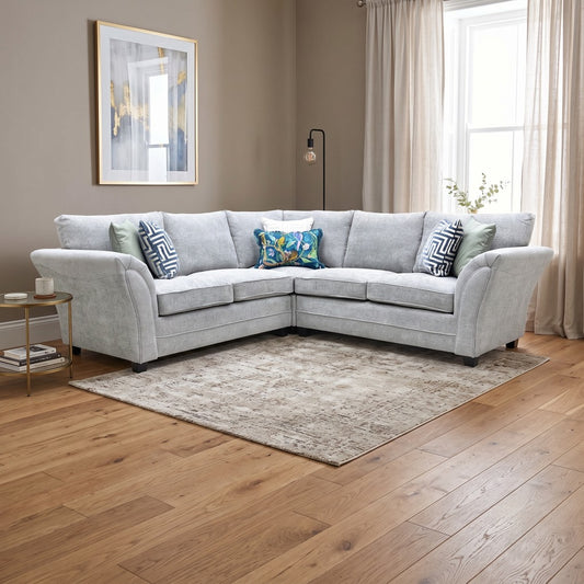 Styled upscale contemporary living room lifestyle layout featuring the complete Dury grey chunky weave fabric corner sofa arranged as a luxurious, cozy family lounge centerpiece.