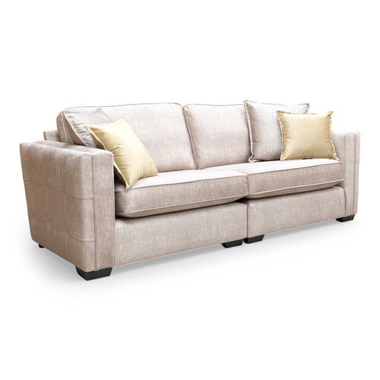 Side view of the Chelsea sofa showcasing the spacious seating area and deep beige upholstery.