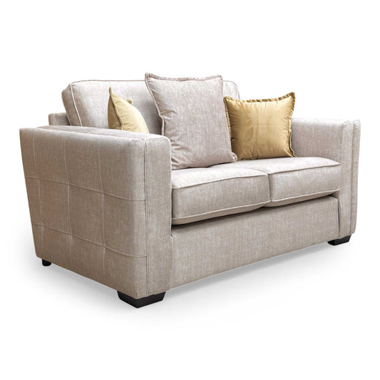 Full view of the Thornbrook ‘Chelsea’ 2-seater sofa in luxurious beige vogue velvet with a formal back design.