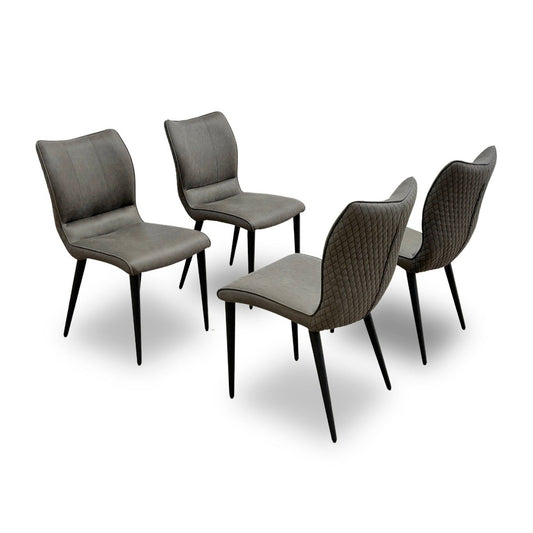 Full view of the set of 4 Murcia dining chairs in antiqued grey fabric with black metal legs.
