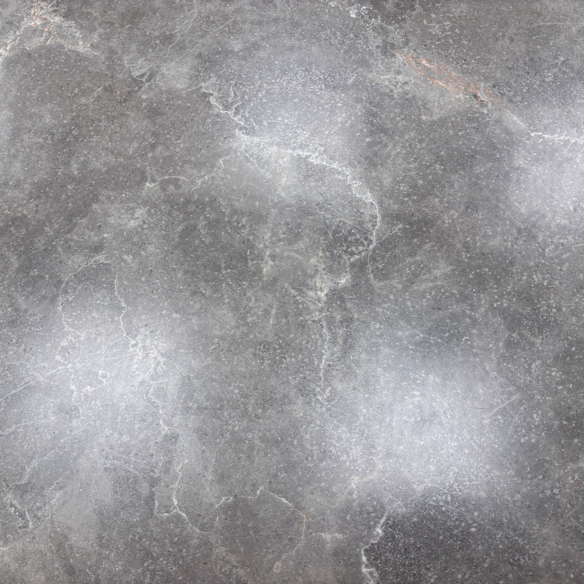 Close-up detail of the grey sintered stone ceramic tabletop, showcasing its smooth, durable, and stain-resistant surface.