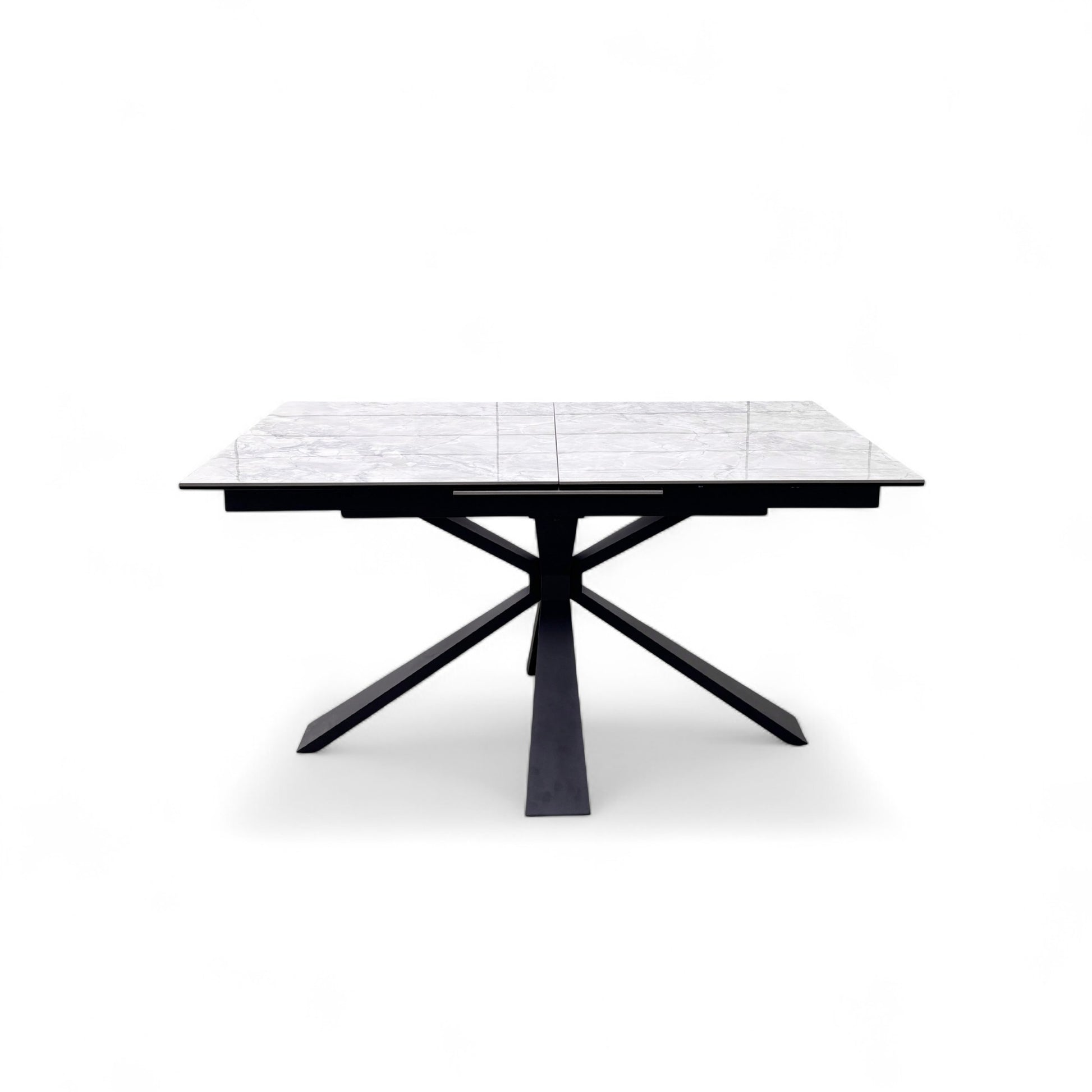 Side View of the sculptural black metal pedestal base that supports the ceramic top of the Crete dining table.