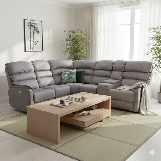Gray sectional sofa in a living room with a wooden coffee table and decorative items.
