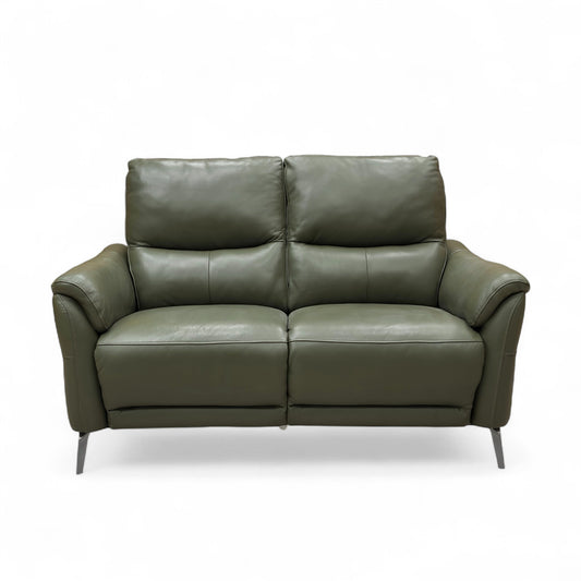 Three-quarter view of the 'Daytona' 2 Seater Sofa in Oslo Pine Green leather, highlighting the gently curved arms and generous seat cushions.
