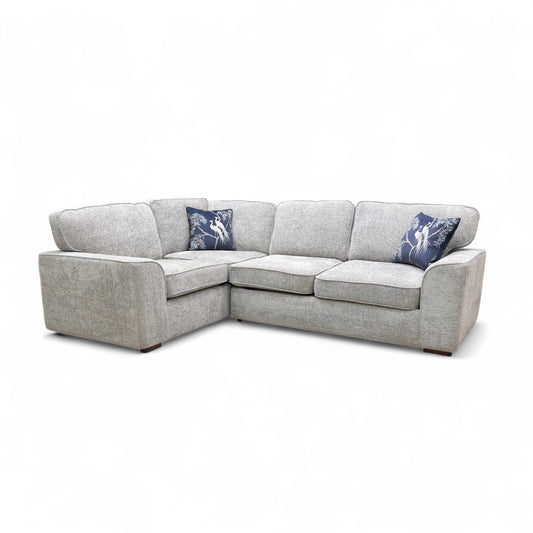 Detail shot of the small left-hand facing chaise section of the 'Emilia' sofa, highlighting the cushion and upholstery texture.