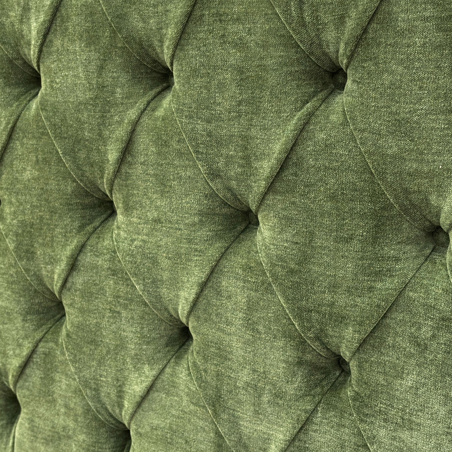 Close-up of the 'Dorian' Floor Standing Headboard, showing the deep button tufting and the texture of the Aston Moss fabric.