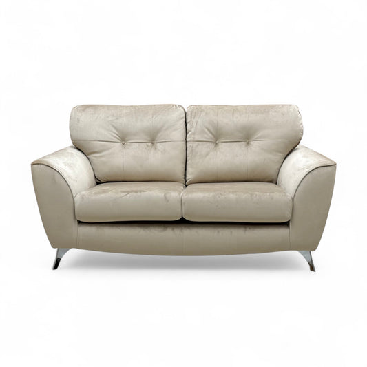 Full front-angled view of the Dawson Mink Velvet 2 Seater Sofa, showing its compact size and plush cushions.