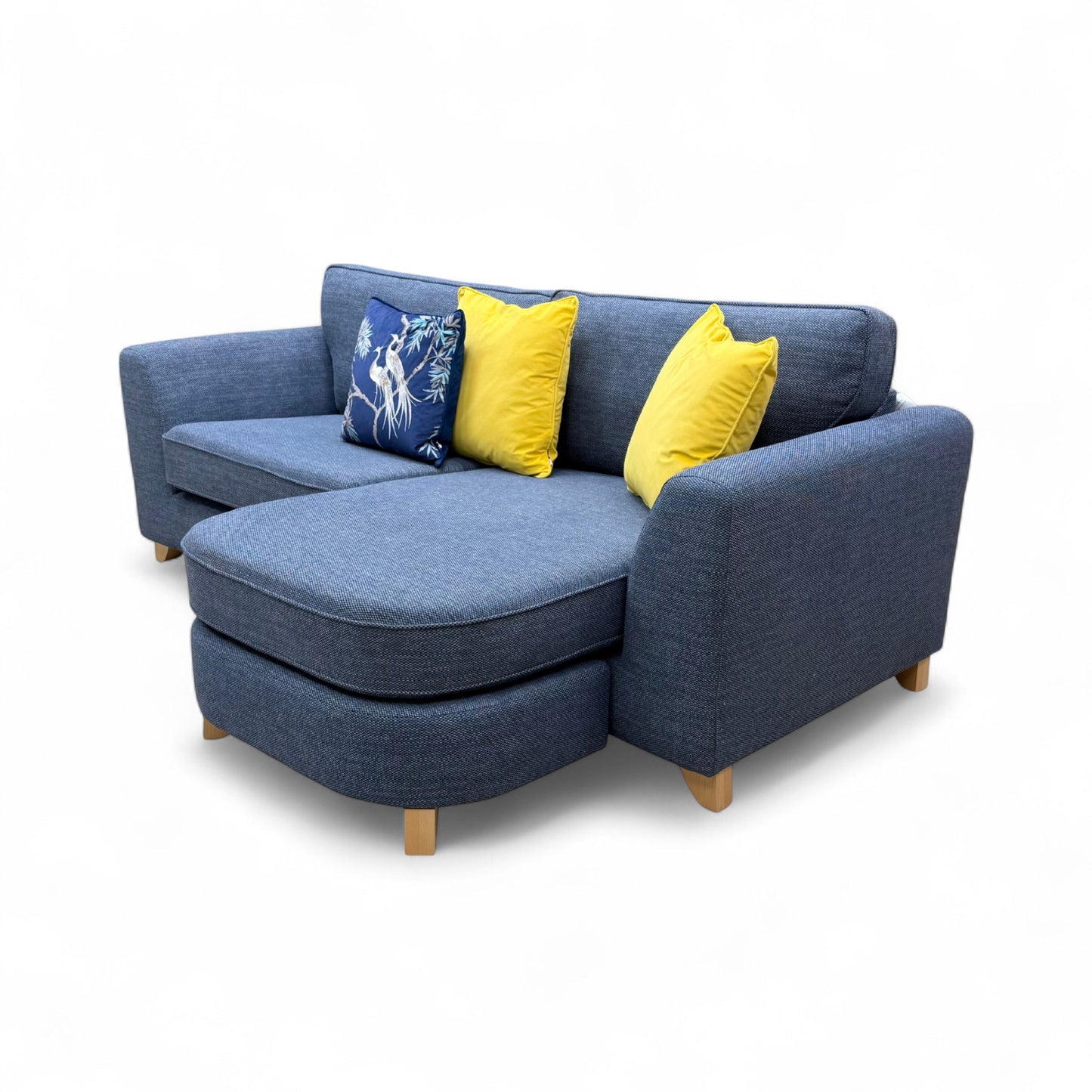A shot focusing on the sofa's seat cushions and the texture of the Navy Selway fabric.