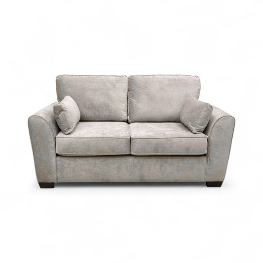 Frontal view of the ‘Julius’ Mink Fabric Sofa, emphasizing the two-seater size, foam-filled seat cushions, and overall modern design.