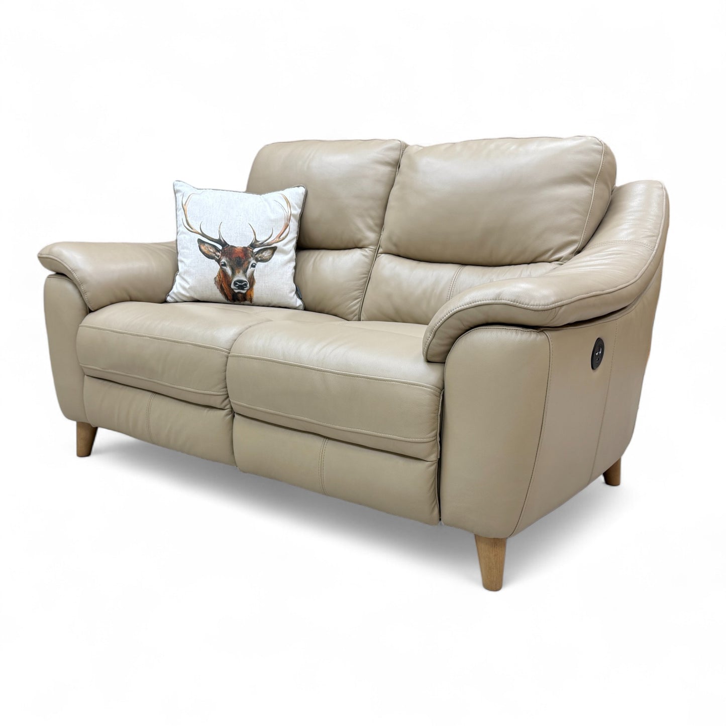 Detail shot of the thick, padded armrest and stitching on the cream leather upholstery of the 'Francis' power recliner sofa.