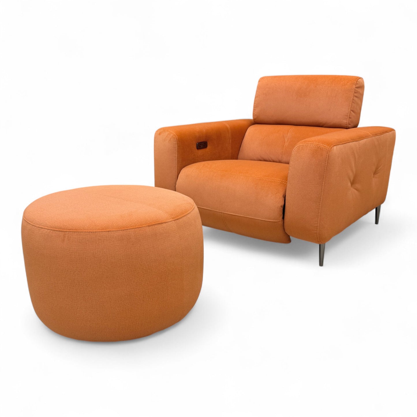 View of the back of the 'Ezra' recliner chair and the round footstool.