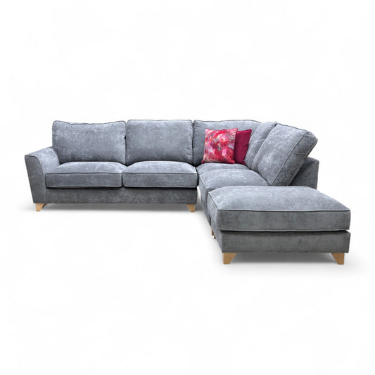 Full view of the Legend Kingston Corner Sofa in grey fabric, showing the classic back cushions and the arrangement that forms the right-hand facing chaise.