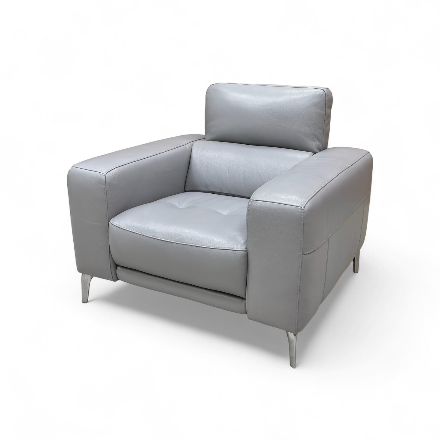 A view focusing on the side profile of the armchair, showing the height and cushion alignment.