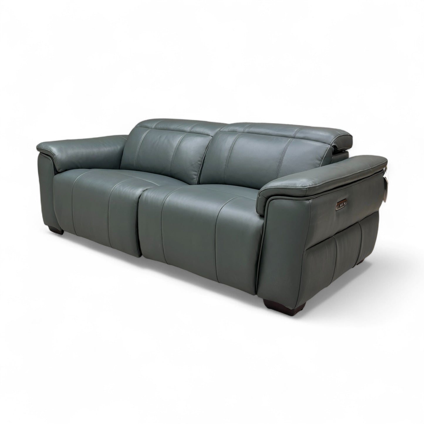 An image showing the sofa from a slight angle, highlighting the depth of the seating and the high-quality look of the leather upholstery.