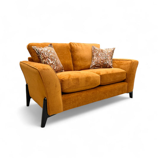 Rear view of the 'Collins' Almond Orange Towel Velvet 2 Seater Sofa, confirming the solid upholstery and modern back style.