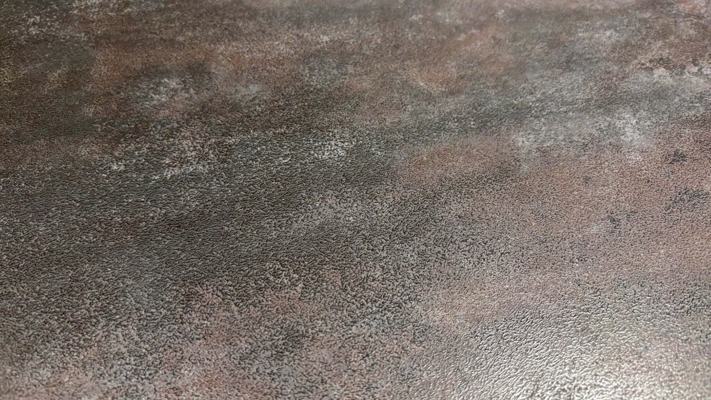 Textured brown surface of a dining table with a gradient effect