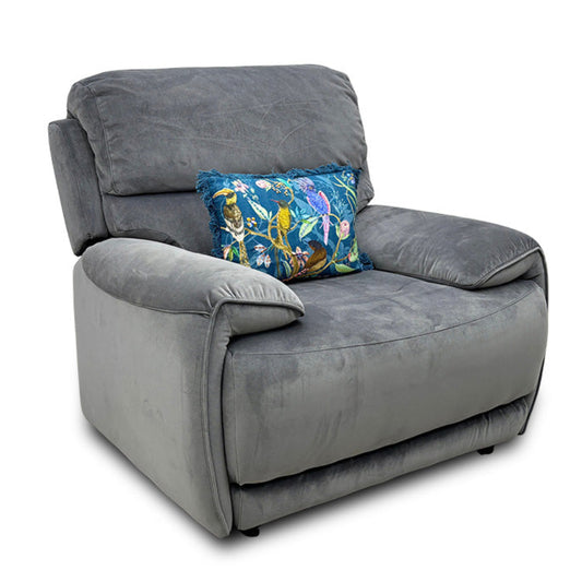 Link pewter velvet armchair, angled view with padded arms and a floral scatter cushion