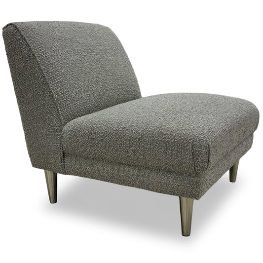 Bellagio boucle grey fabric accent chair, angled view from the left showing the slipper-style back and tapered metal legs