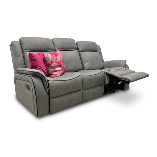 Gray sofa with pink cushions on a white background