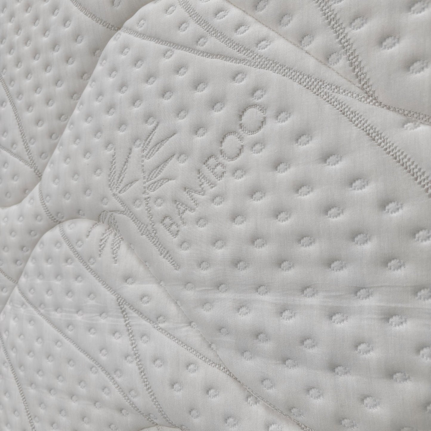 Kudos 2000 Pocket Sprung Mattress Single on a wooden bed frame in a bedroom lifestyle setting