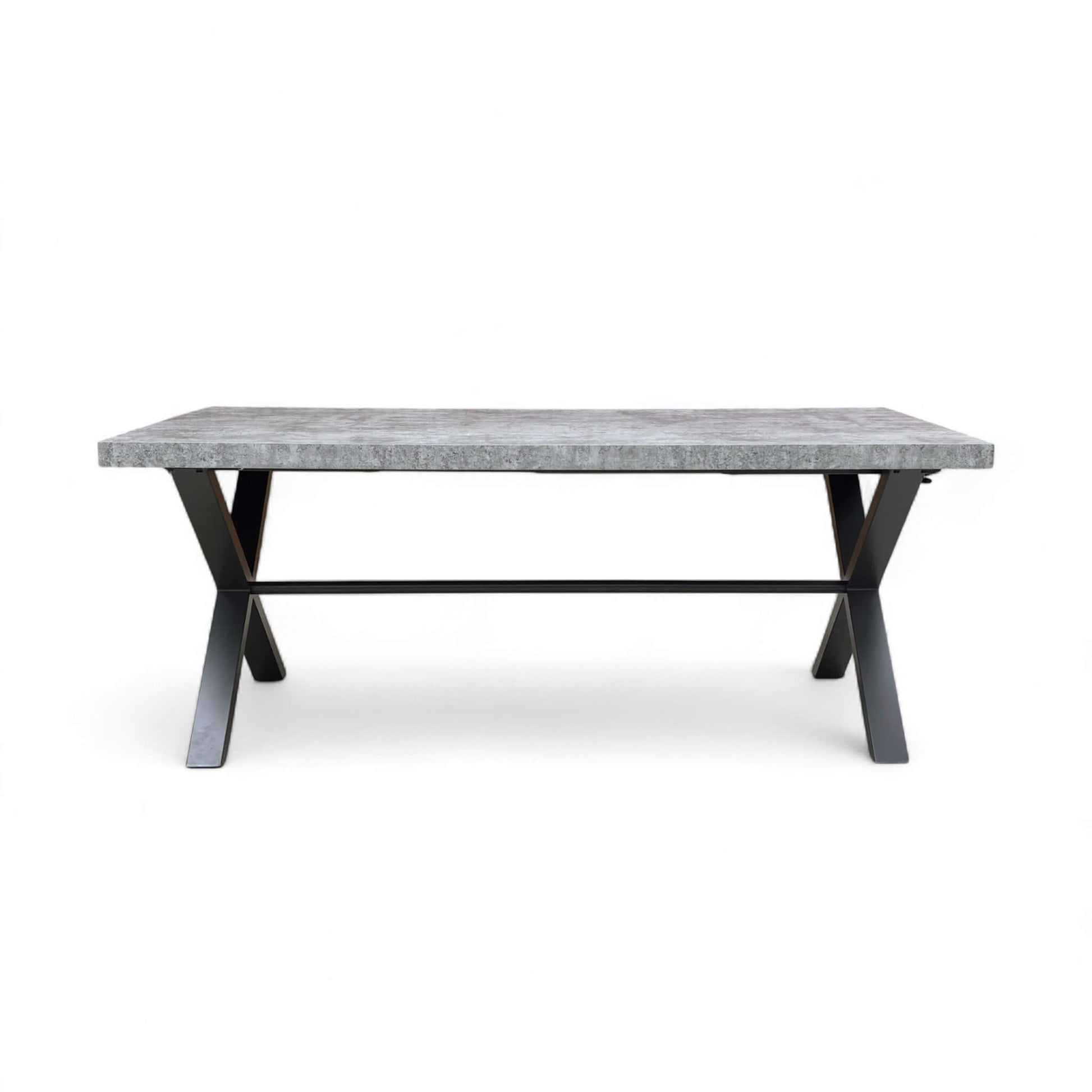 Dining table with marble top and black metal legs on a white background
