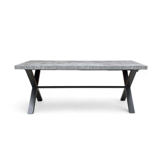 Dining table with marble top and black metal legs on a white background
